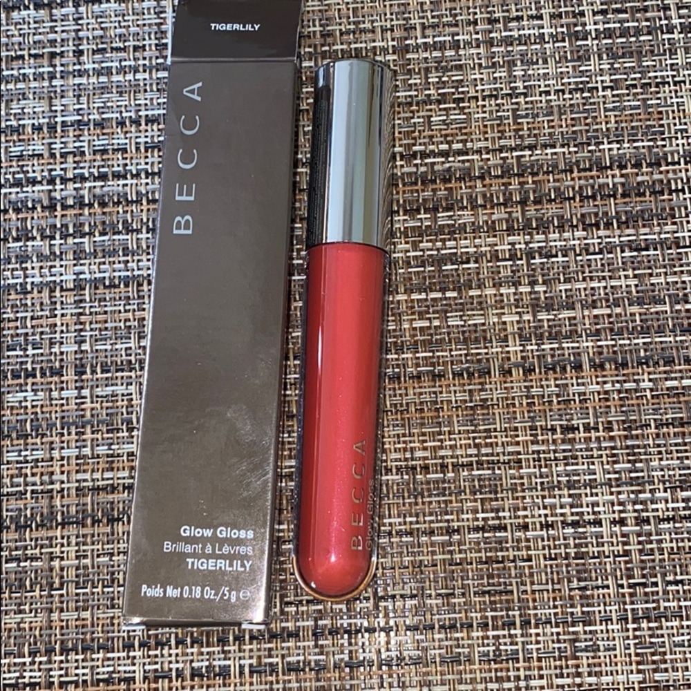 NEVER USED BECCA GLOW GLOSS color TIGERLILY